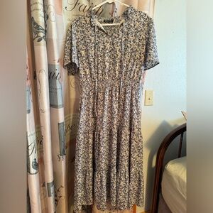 Blue floral dress, tie neck and smocked waist